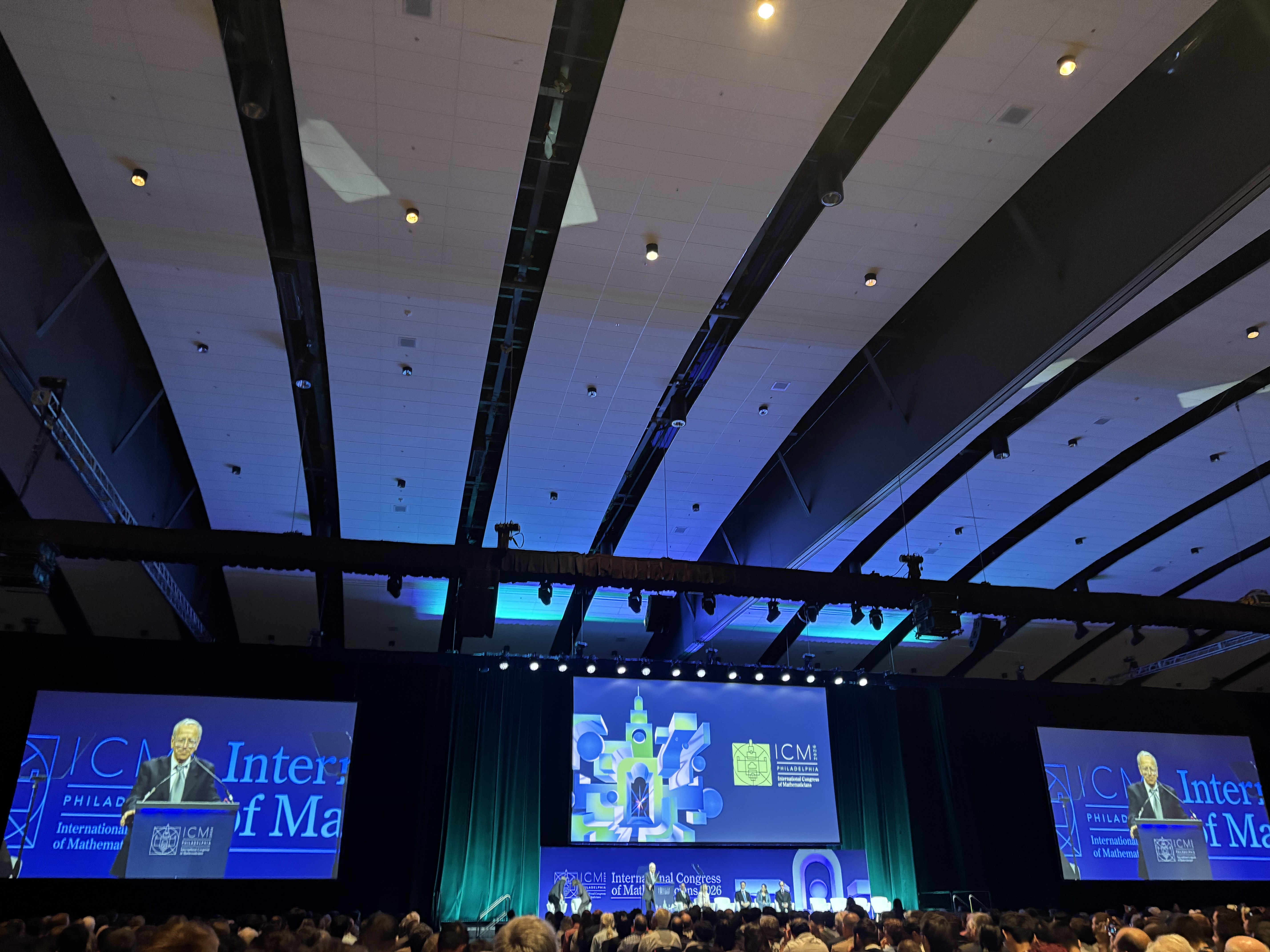 A photo Jalal Shatah speaking at the opening ceremony of the 2026 ICM